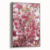 Framed canvas featuring a vintage landscape art painting with colorful trees and a black background.