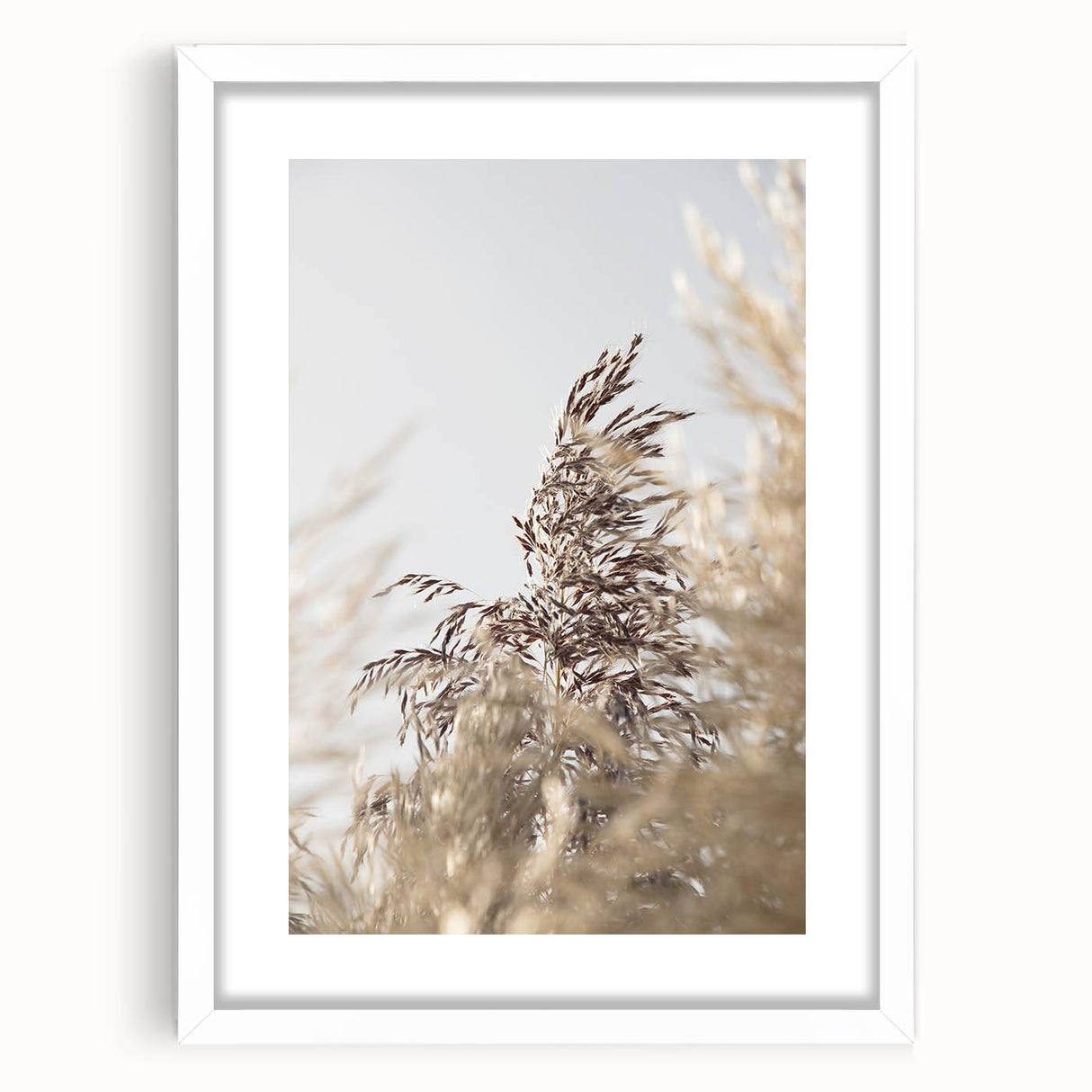 Abstract art print featuring vibrant summer hues on a white-framed canvas, ideal for bedroom or dining room decor.