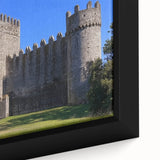 Close-up of a beautifully framed canvas art piece depicting a serene landscape with a majestic castle, showcasing vibrant colors and intricate details, perfect for home decor.