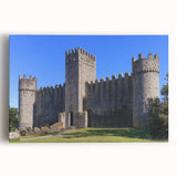 Stretched canvas featuring a vibrant landscape of a majestic castle surrounded by lush greenery and a clear blue sky, ideal for home decor and art lovers.