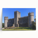 Stretched canvas artwork depicting a serene landscape with a historic castle surrounded by lush greenery, perfect for enhancing home decor and evoking tranquility.