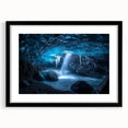 Framed landscape artwork depicting a serene cave scene with a black mat surround, perfect for enhancing modern home decor and creating a tranquil atmosphere.