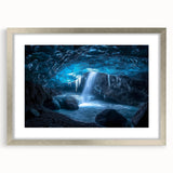Framed landscape artwork featuring a stunning cave scene with a silver mat, perfect for home decor or office settings, showcasing intricate details and natural colors.