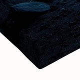 Close-up of a vibrant stretched canvas showcasing a colorful abstract landscape with intricate cave-like designs, ideal for modern home decor and art enthusiasts.