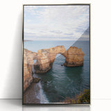 Framed acrylic artwork showcasing a dramatic cliff landscape with silver accents, perfect for modern home decor. Ideal for adding elegance to any room.
