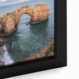 Framed canvas art depicting a dramatic cliff landscape with vibrant colors and intricate details, ideal for enhancing home decor with nature-inspired aesthetic.