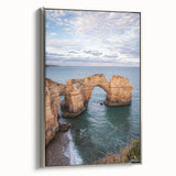 Framed canvas artwork showcasing a stunning landscape of cliffs, featuring a silver frame that enhances its modern aesthetic, perfect for home decor.