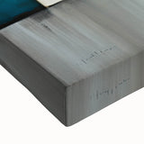 Abstract architectural wall art on stretched canvas, showcasing vibrant geometric patterns and textures in shades of blue and gold, perfect for modern decor.