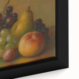 Close-up of black wall art featuring colorful, textured fruits on a large framed canvas, ideal for living room decor.