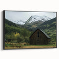 Black-framed landscape canvas art showcasing a serene barn scene, highlighting rich colors and textures, ideal for rustic home decor enthusiasts.