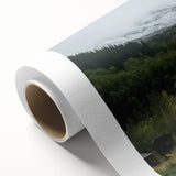 Rolled canvas showcasing a vibrant landscape barn design, featuring rich colors and intricate details, securely packaged in a durable tube for safe transport.