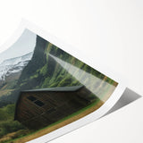 Rolled canvas print showcasing a vibrant landscape design featuring a rustic barn under a clear blue sky, elegantly packaged in a protective cardboard tube.