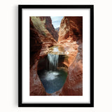 Black-framed landscape artwork featuring canyons, showcasing rich earth tones and detailed textures, ideal for home decor and nature enthusiasts.