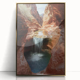 Framed acrylic artwork showcasing a landscape of vibrant canyons, highlighted by a gold frame that enhances its natural beauty, perfect for home decor.