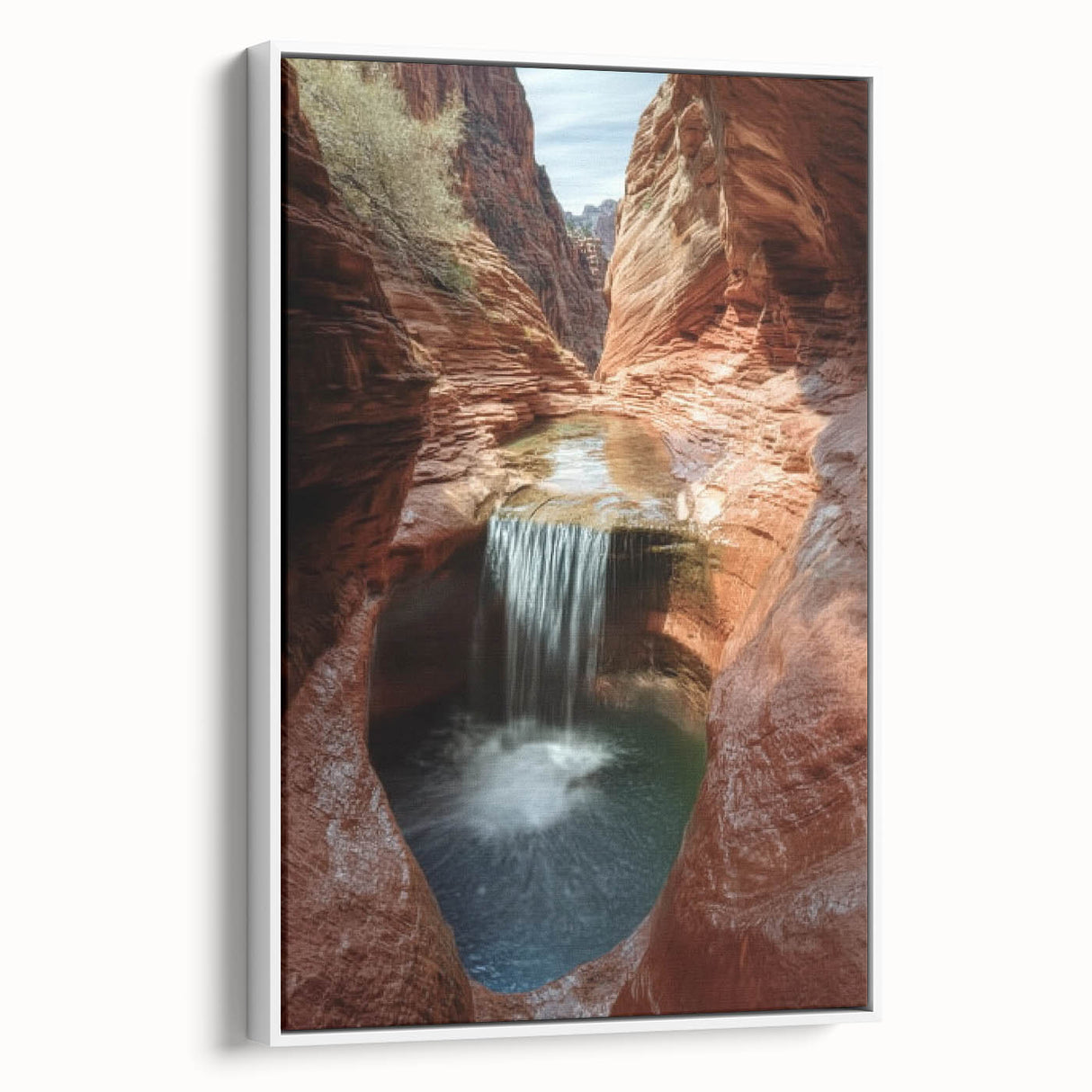 Framed canvas artwork showcasing a stunning landscape of canyons, featuring vibrant earth tones and intricate details, ideal for enhancing home decor.