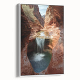 Framed canvas artwork showcasing a stunning landscape of canyons, featuring vibrant earth tones and intricate details, ideal for enhancing home decor.