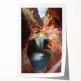 Vibrant landscape print showcasing majestic canyons in earthy tones, rolled for easy transport and framed for an elegant display, perfect for enhancing home decor.