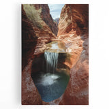Stretched canvas art displaying a vibrant canyon landscape with rich earth tones and dramatic rock formations, perfect for enhancing home decor and bringing nature indoors.