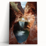 Stretched canvas artwork depicting a vibrant landscape of canyons in warm earth tones, ideal for enhancing home decor with a natural aesthetic.