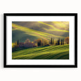 Framed landscape artwork showcasing a serene countryside scene with vibrant green fields and a clear blue sky, presented in a sleek black mat frame. Ideal for home decor.