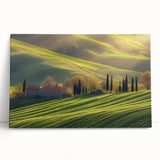 Stretched canvas artwork depicting a serene countryside landscape with vibrant green fields and a clear blue sky, perfect for enhancing home decor and creating a calming atmosphere.
