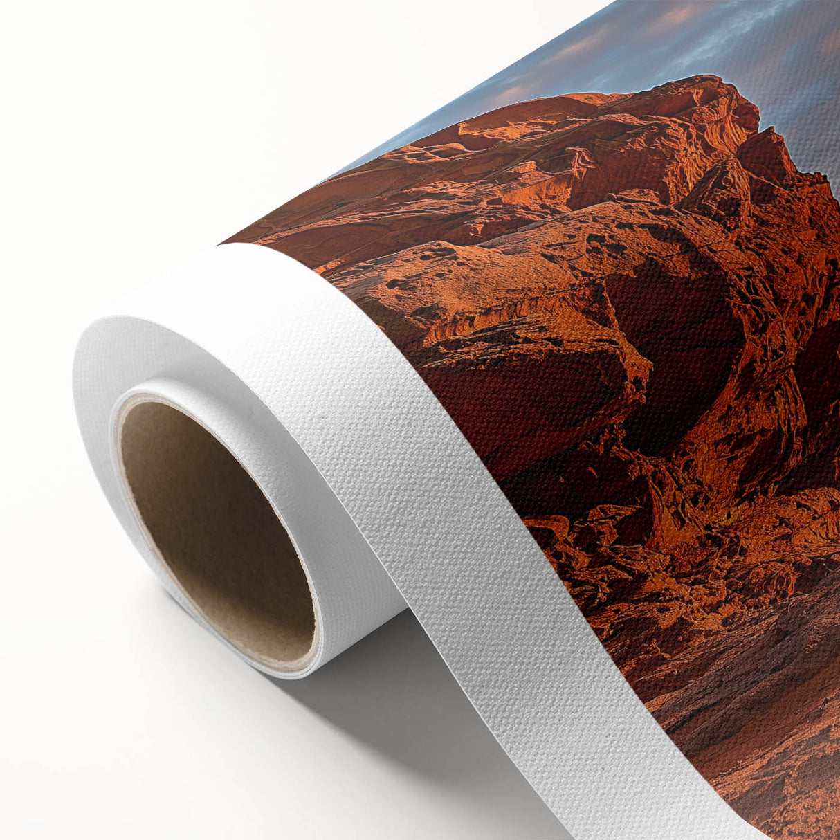 Desert landscape rolled canvas art showcasing vibrant orange and yellow hues of a sunset over sandy dunes, elegantly packaged in a protective cardboard tube.