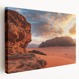 Desert landscape stretched canvas art featuring warm tones of orange and yellow, showcasing a serene sunset over sand dunes, ideal for home decor and wall art.