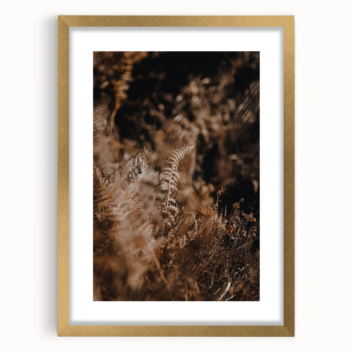 Extra large abstract art print featuring textured swirls in autumn hues on a gold-framed canvas, ideal for living room decor.