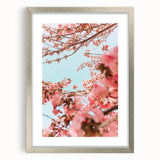 Textured abstract art print in silver frame, featuring soft pastel colors, ideal for bedroom wall decor.