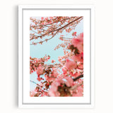 Abstract art print in soft pastel colors on a white framed canvas, suitable for bedroom or dining room decor.