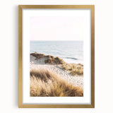 Extra large abstract art print in gold frame, featuring textured swirls in warm tones, suitable for living room decor.