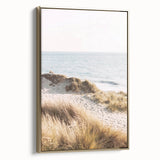 Framed canvas depicting a vintage-style landscape with muted gold and black tones, ideal for bedroom wall decor.
