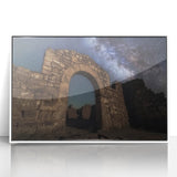 Framed acrylic artwork of a serene landscape featuring a castle surrounded by lush greenery, presented in a sleek white frame for an elegant decor accent.