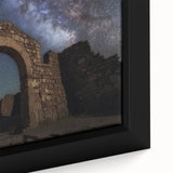 Framed canvas artwork depicting a vibrant landscape with a majestic castle surrounded by lush greenery and a clear blue sky, showcasing intricate details and vivid colors.