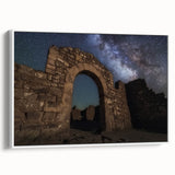 Framed canvas artwork depicting a serene landscape with a majestic castle, featuring a white frame and side view, perfect for home decor and art enthusiasts.