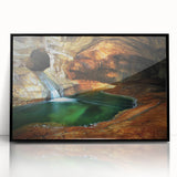 Framed acrylic artwork depicting a stunning cave landscape in rich colors, designed to enhance modern interiors with its dramatic front view and sleek black frame. Ideal for nature lovers and contemporary decor enthusiasts seeking unique wall art.