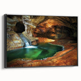 Framed black canvas displaying a stunning landscape of caves, showcasing intricate textures and earthy tones, ideal for modern home decor and art enthusiasts.