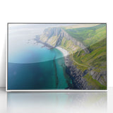 Framed acrylic landscape artwork depicting majestic cliffs against a serene sky, presented in a modern white frame, perfect for enhancing home decor.