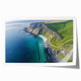 Vibrant rolled print of a scenic landscape showcasing dramatic cliffs and a serene sky, designed for wall decor, presented in a protective cardboard tube.