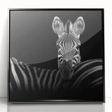 Framed acrylic artwork showcasing a vibrant design of various animals in a black frame, perfect for enhancing home decor and adding a touch of nature-inspired elegance.