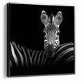 Framed canvas artwork showcasing a vibrant animal design, featuring bold colors and intricate details, viewed from the side against a neutral background.