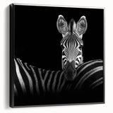 Framed canvas artwork showcasing a vibrant animal design, featuring bold colors and intricate details, viewed from the side against a neutral background.