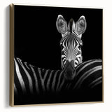 Framed canvas artwork showcasing an elegant design of various animals in silver and gold tones, beautifully displayed against a textured background, perfect for home decor.
