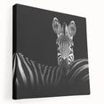 Stretched canvas artwork showcasing a vibrant animal design, featuring rich colors and textures, ideal for enhancing home decor and available in various sizes.