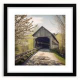 Extra large abstract art print featuring a colorful, textured depiction of a covered bridge, framed in black.