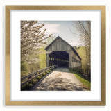 Extra large abstract art print of a covered bridge in textured gold and brown tones on a framed canvas.