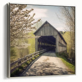 Framed canvas of a vintage-style landscape painting featuring a covered bridge in muted earth tones.