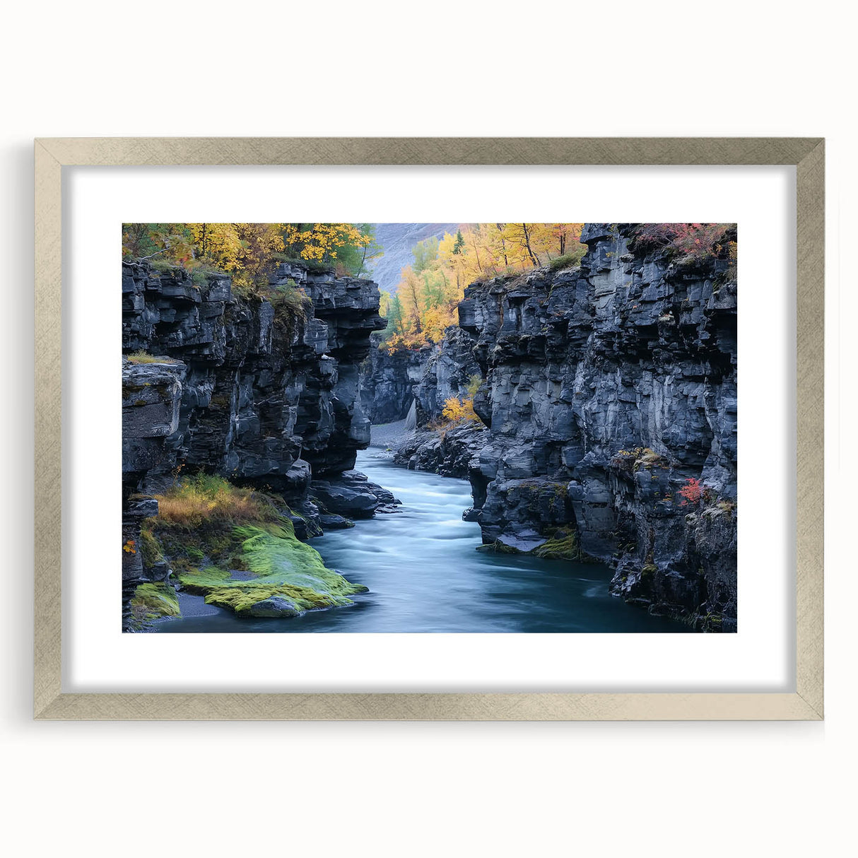 Silver-framed landscape artwork depicting a vibrant canyon scene, featuring rich colors and intricate details, suitable for home decor or art enthusiasts.