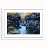 Landscape artwork showcasing vibrant canyons in a white frame with a mat, ideal for home décor or office settings, enhancing interior aesthetics.