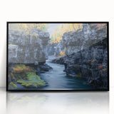 Framed acrylic artwork depicting a vibrant landscape of canyons, featuring rich earth tones and dramatic rock formations. Ideal for modern home decor or office settings, this piece adds a touch of nature-inspired elegance to any space.